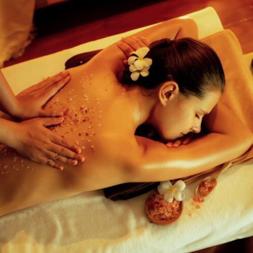 woman-customer-having-exfoliation-treatment-luxury-spa-quiescent_31965-434990